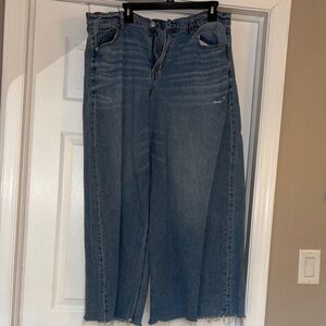 American Eagle Outfitters wide leg frayed hem jeans